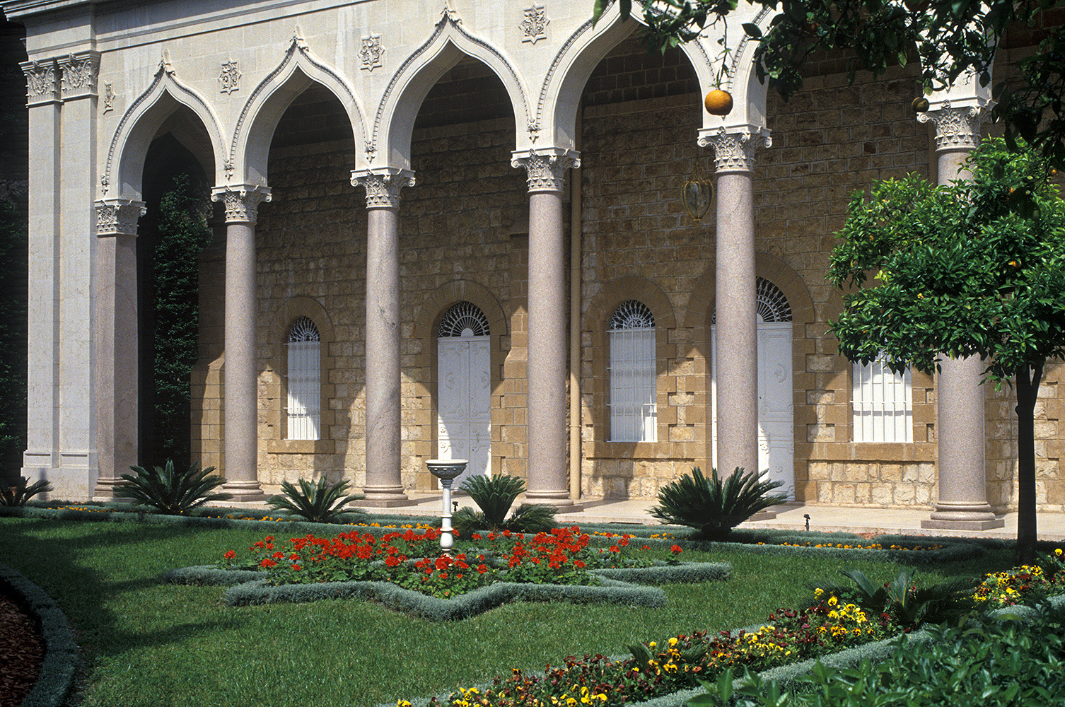A colonnade and formal garden adorn the Shrine of the Bab in Haifa. The burial site of the Bab, the forerunner of Baha’u’llah and also considered a Messenger of God, is inside the building.