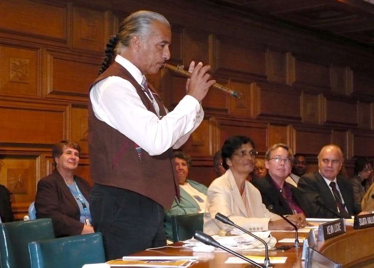 Kevin Locke plays flute at a UN roundtable on the International Day for the Eradication of Poverty. He opened the roundtable with a prayer recited in his native Lakota Sioux dialect. The event was at the United Nations in New York on 17 October 2008.