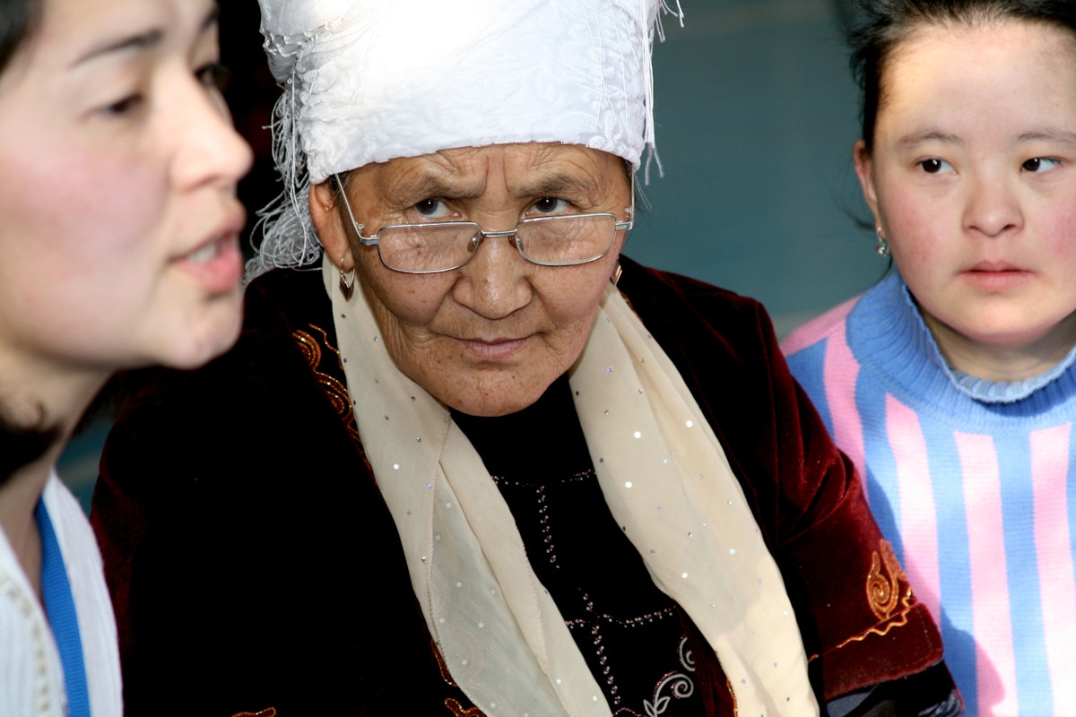 A participant from Kyrgyzstan, center, listens intently as a young woman from Kazakhstan speaks during a workshop at the conference in Almaty on the weekend of 6-7 December.