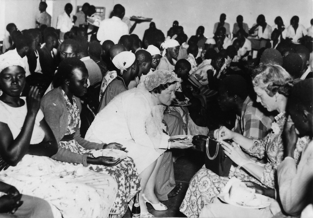 Ruhiyyih Khanum, who served as the representative of the Guardian at the Kampala conference in January 1958, is shown with others at the gathering. (Baha’i World Centre photograph)