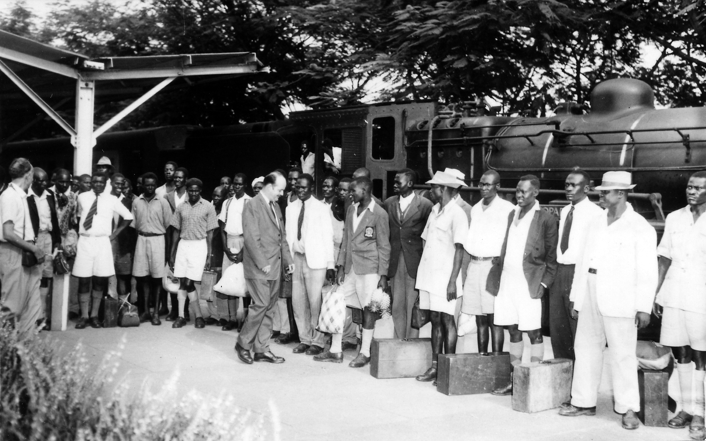 William Sears, Baha'i Hand of the Cause, greets people attending the Kampala conference in 1958. (Baha’i World Centre photograph)