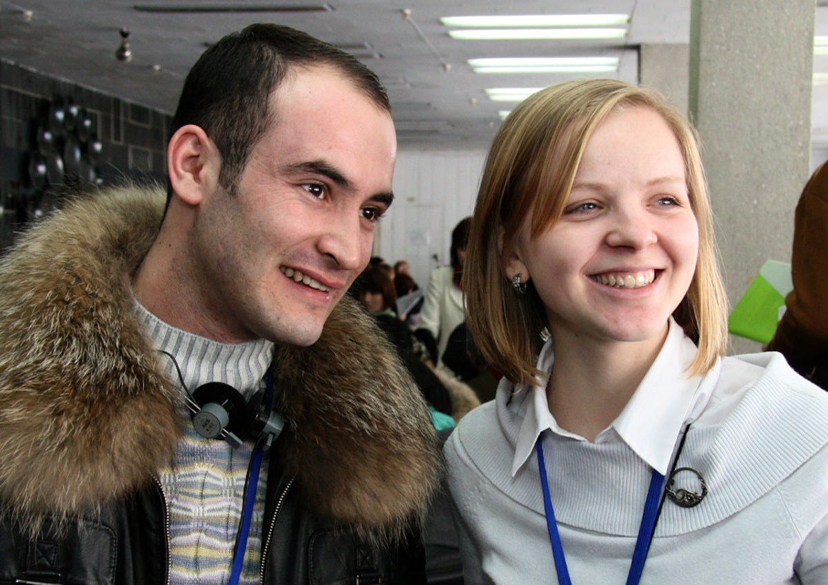 A total of 77,700 people participated in the 41 conferences, held in cities around the globe. Shown here in Kiev are Zafar Hamraev of Moscow and Eugenia Poluektova of Kiev.