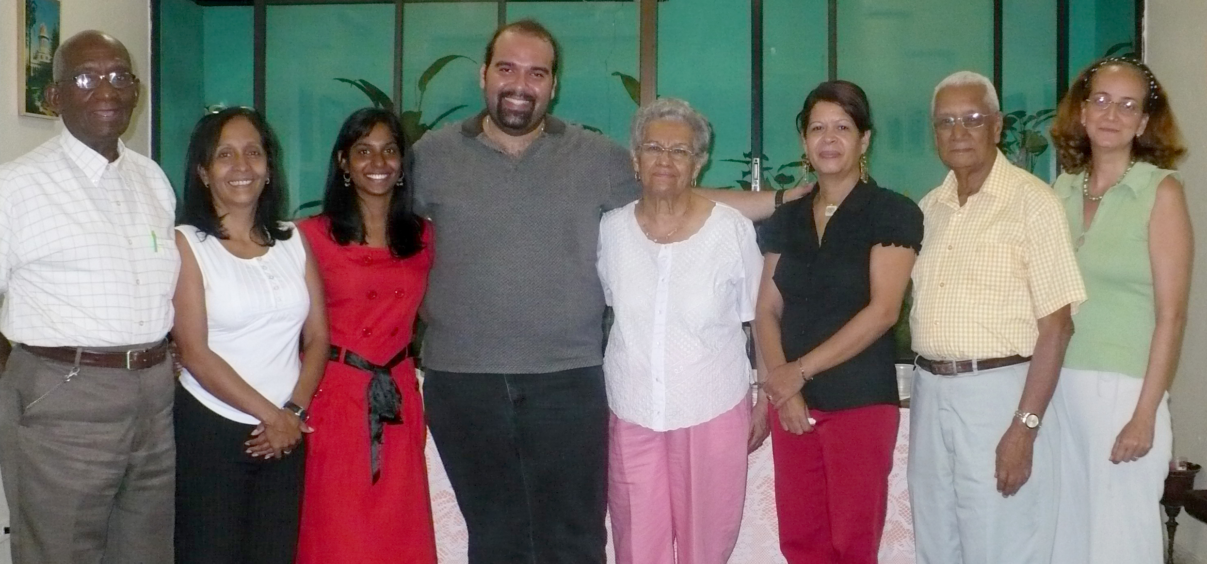Eight of the nine members of the newly elected Spiritual Assembly of Santo Domingo, Dominican Republic, pose for a photograph.