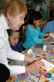 Beth McKenty, left, was nearly 70 years old when she started the art program a decade ago. (Photo copyright 2004 Nunatsiaq News. Used with permission.)