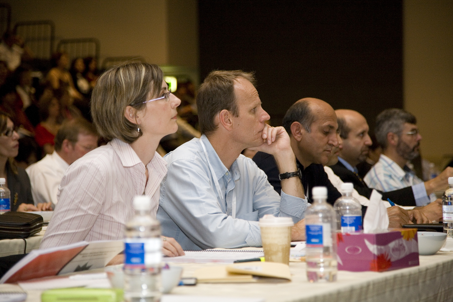 Delegates to the national convention pay close attention during the consultation.