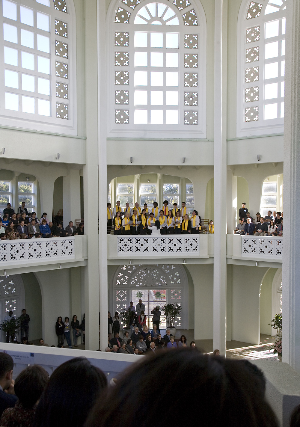 The Baha'i House of Worship in Sydney was the site of a devotional program on 26 April in honor of the 75th anniversary of the National Spiritual Assembly of Australia. The Baha'i choir performs from a balcony. (Photographs by Rachael Dere)