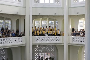 The Baha'i House of Worship in Sydney was the site of a devotional program on 26 April in honor of the 75th anniversary of the National Spiritual Assembly of Australia. The Baha'i choir performs from a balcony. (Photographs by Rachael Dere)