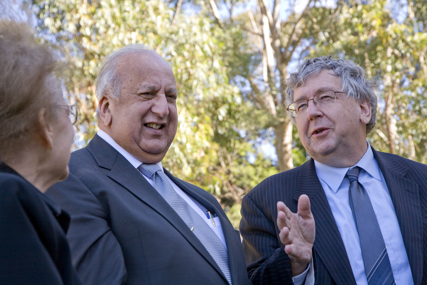 Member of Parliament Laurie Ferguson, right, delivered a message from the prime minister at a reception on 26 April. At left are Dr. Janet Khan and Dr. Peter Khan, a member of the Universal House of Justice who spoke at the reception and also at a large gathering the previous evening at the Sydney Convention Centre.