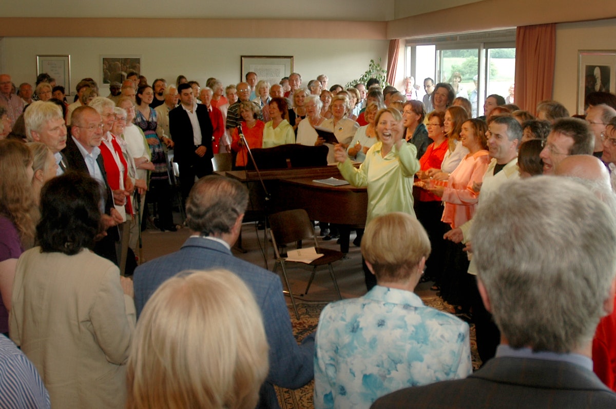 After the devotional at the Baha'i House of Worship in Langenhain, singers walked to the nearby Baha'i center for a second program (shown here) where both the Langenhain and Baha'i choirs again performed for the townspeople.