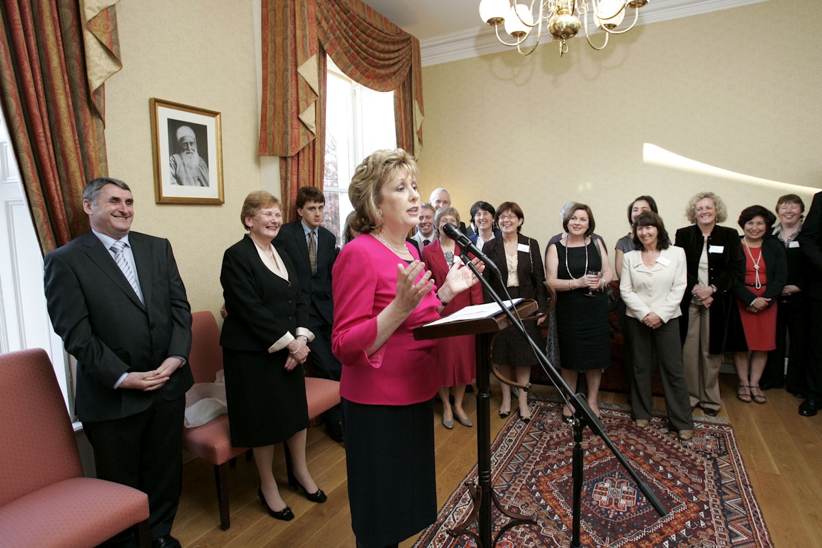 Irish President Mary McAleese addresses the gathering at the Dublin Baha'i Centre
