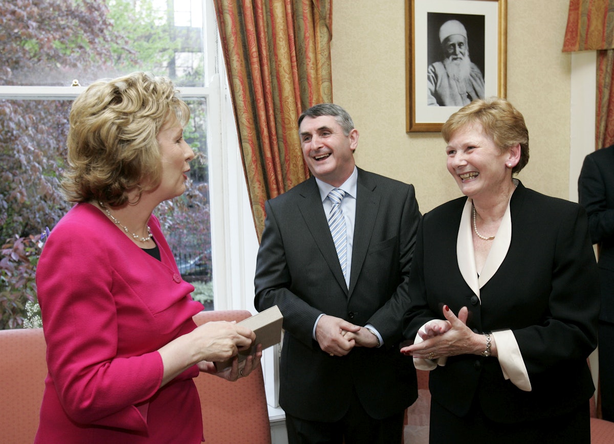 The President of the Republic of Ireland, Mary McAleese, left, talks with two members of the National Spiritual Assembly of the Baha'is of Ireland - Mr. Brendan McNamara and Mrs. Alison Wortley.