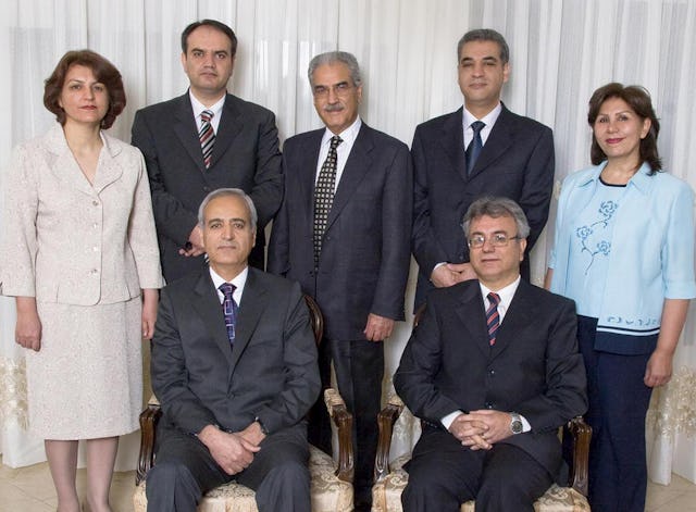 The seven Baha'i prisoners, photographed several months before their arrest, are, in front, Behrouz Tavakkoli and Saeid Rezaie, and, standing, Fariba Kamalabadi, Vahid Tizfahm, Jamaloddin Khanjani, Afif Naeimi, and Mahvash Sabet.