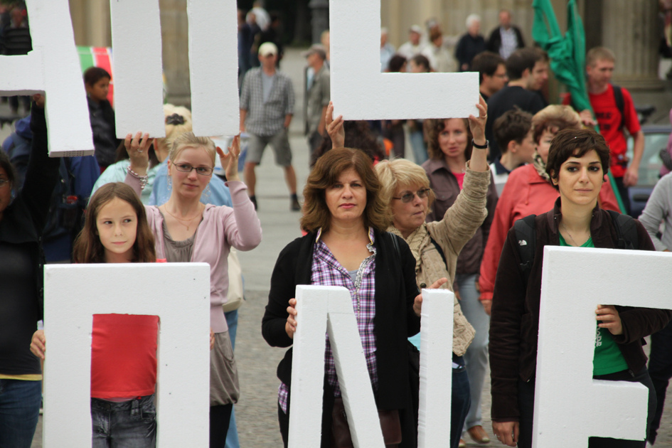In Berlin, Germany, human rights campaigners of varied ages and backgrounds call for freedom for Iran's political prisoners.