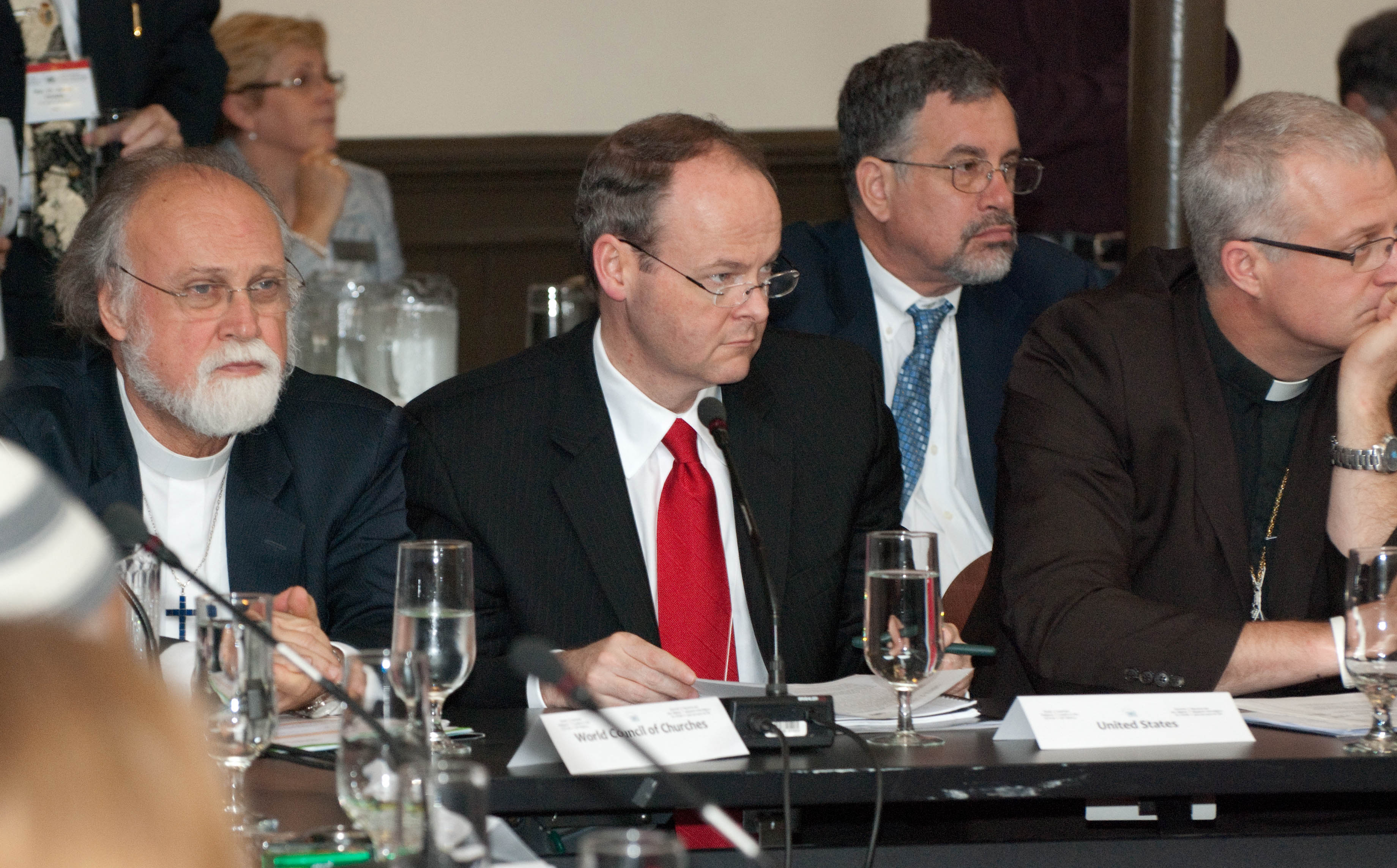 Kenneth E. Bowers, Secretary-General of the National Spiritual Assembly of the Baha’is of the United States, centre, was among the Baha’i delegates to the World Religion Summit, the first G8-related interfaith Summit in which Baha'is have participated. Photograph by Louis Brunet.