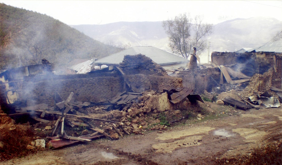 The remains of the home of Mr. Ata'u'llah Movaffaghi and the late Seyyed Mahdi Sadeghi after being torched in May 2007.