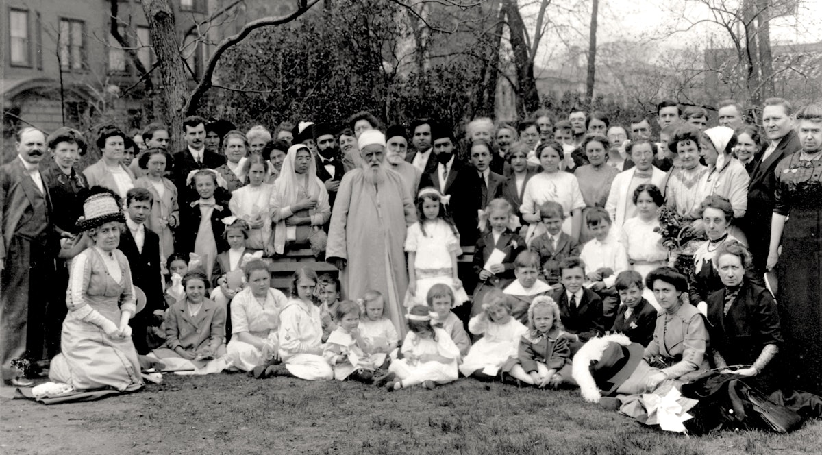 'Abdu'l-Baha with friends in Lincoln Park, Chicago in 1912. This city was particularly dear to Him, He told His followers, because it was where the first Baha'i centre had been established on the American continent.