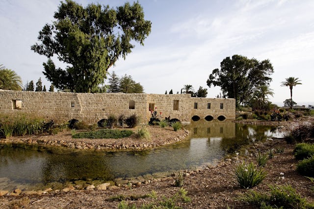 Some of the 15 flour mills that once operated in parallel at the southern end of the Ridvan Garden have also been restored. This view shows the mill buildings, and some newly-created island features in the water.