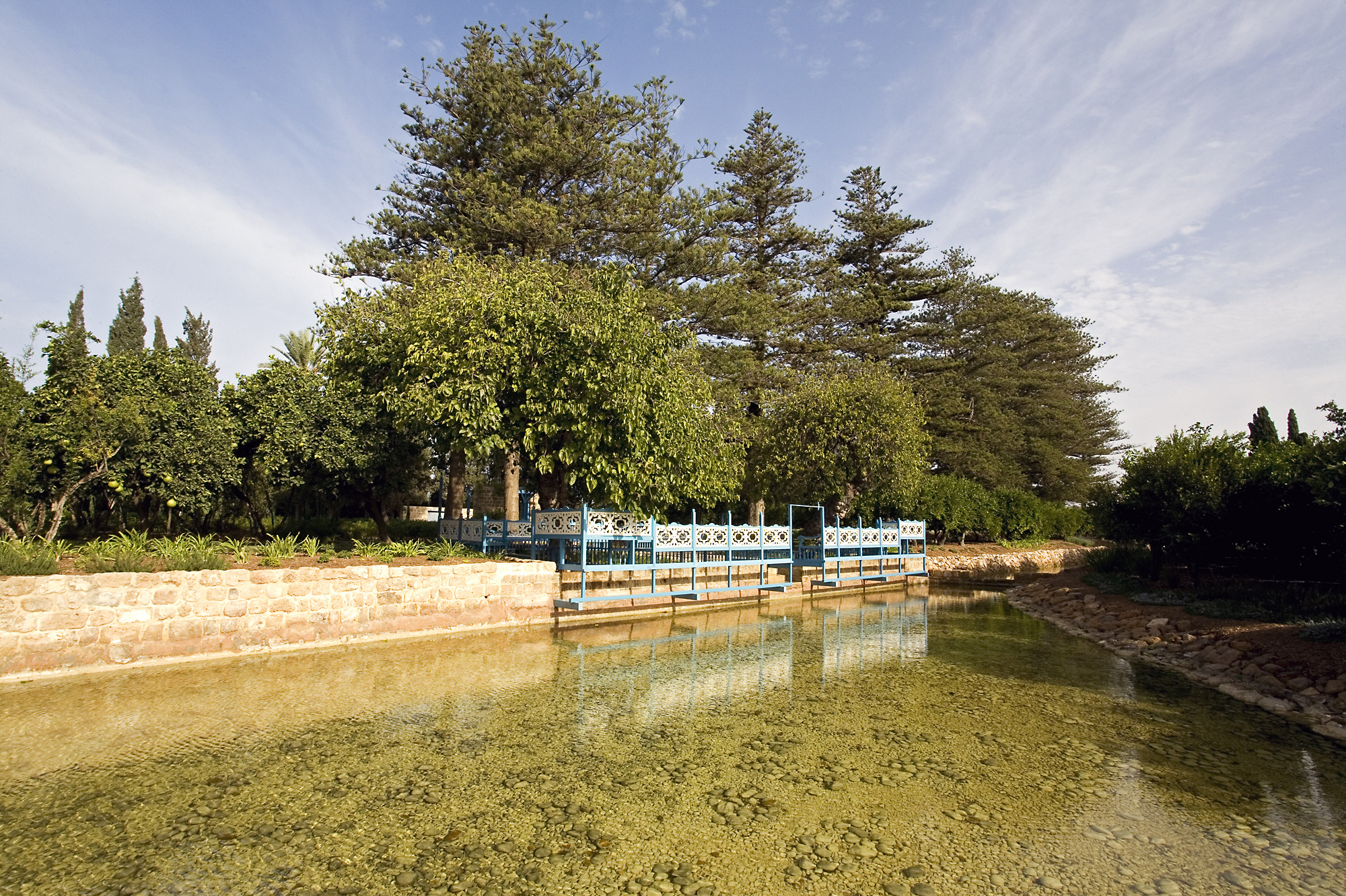 With the restoration of the canals around the Ridvan Garden, its carved blue benches are once again cantilevered out over water.