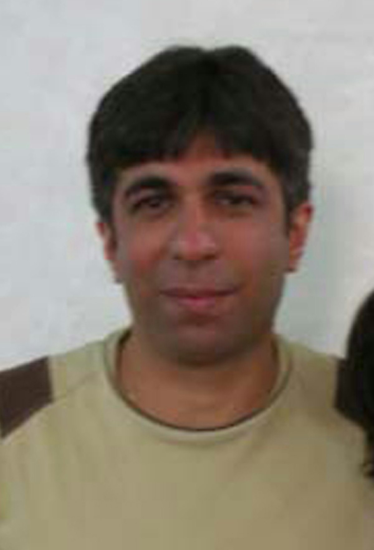 Sasan Taqva - pictured in May 2009, 18 months into his four-year imprisonment in a Ministry of Intelligence detention center in Shiraz. Throughout his imprisonment, Mr. Taqva suffered severe pain from a leg injury, sustained in a car accident, and sciatic and muscle weakness caused by the lack of basic facilities. Daily exercise and access to fresh air was limited to 30 minutes each day when he was taken - blindfolded - not outside, but to a room that had no roof.