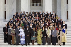 Members of the Continental Boards of Counsellors - gathered on the steps of the Seat of the Universal House of Justice - with members of the Universal House of Justice and the International Teaching Centre. The five Continental Boards of Counsellors have the responsibility of educating, encouraging, and stimulating the development of Baha'i communities throughout the world. The photograph was taken on the first day of their conference, 28 December 2010.