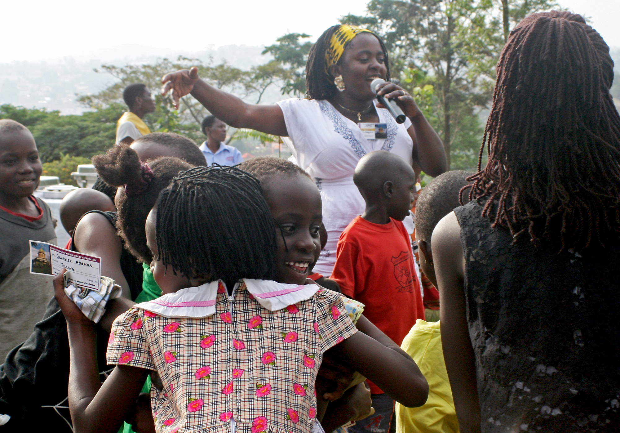 Children taking part in activities on the grounds of Kampala's Baha'i temple, marking the fiftieth anniversary of its inauguration in January 1961. "It's my first time to come to the Mother Temple of Africa and it's very special." said Isaac, a visitor from Angola. "It's very beautiful to see the friends from all over the continent and different countries because it's uniting friends from all walks of life."