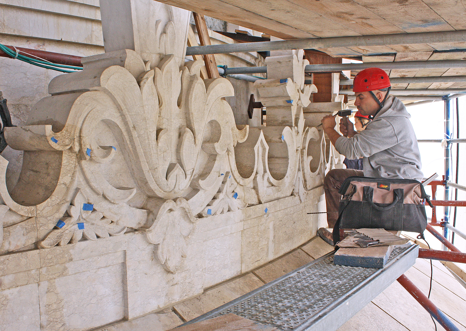 Workers went over the entire stone exterior of the Shrine and repaired every spot that showed signs of damage from 50 years of exposure to the elements. Photo credit: Baha’i World Centre photo. All rights reserved.