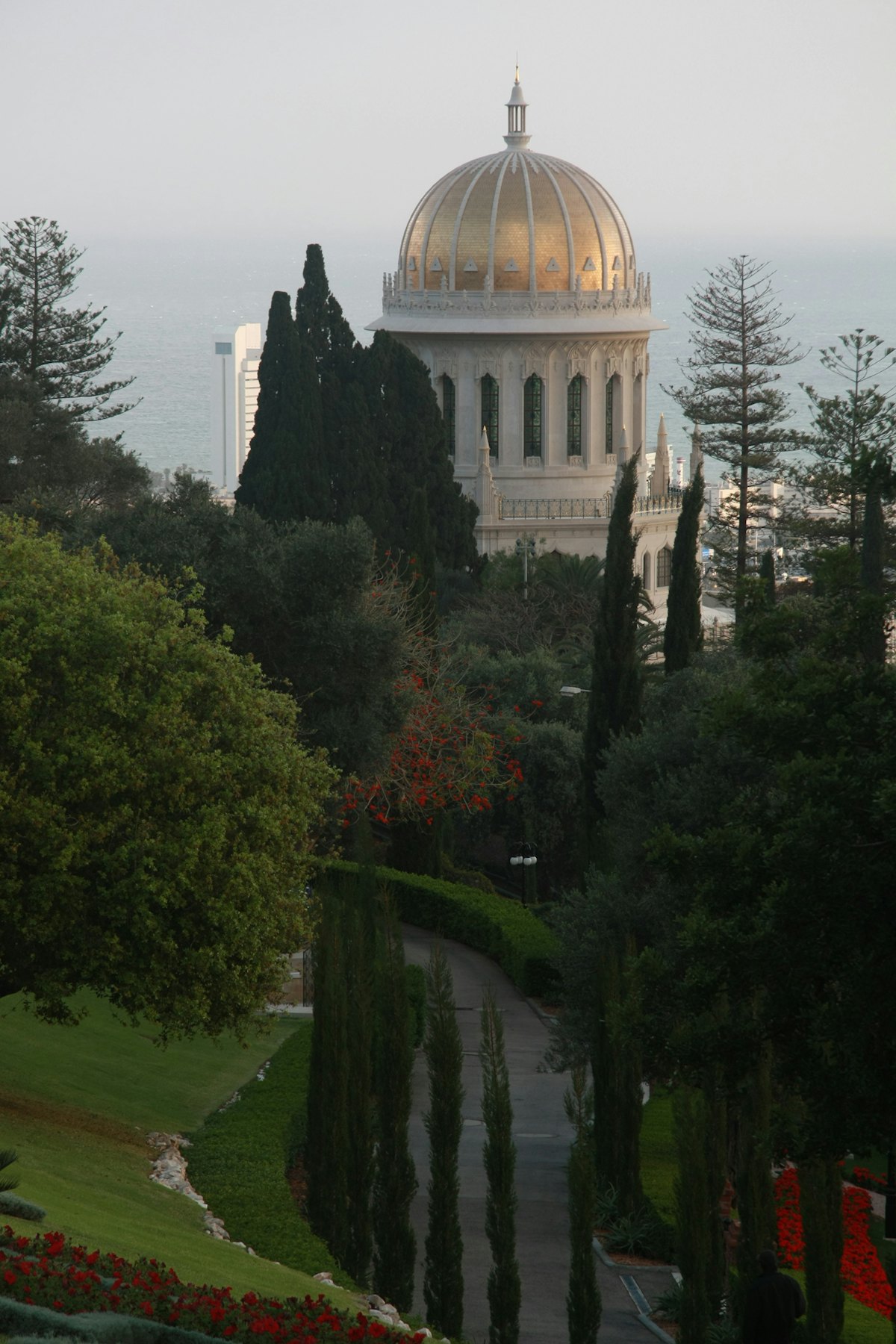 The Shrine of the Bab viewed from the complex of Baha'i administrative buildings on Mount Carmel. New techniques had to be developed to replace the Shrine's 11,790 golden tiles, in more than 120 different shapes and sizes. Master mason Bruce Hancock from New Zealand described the restored Shrine as "an awesome sight." Photo credit: Baha’i World Centre photo. All rights reserved.