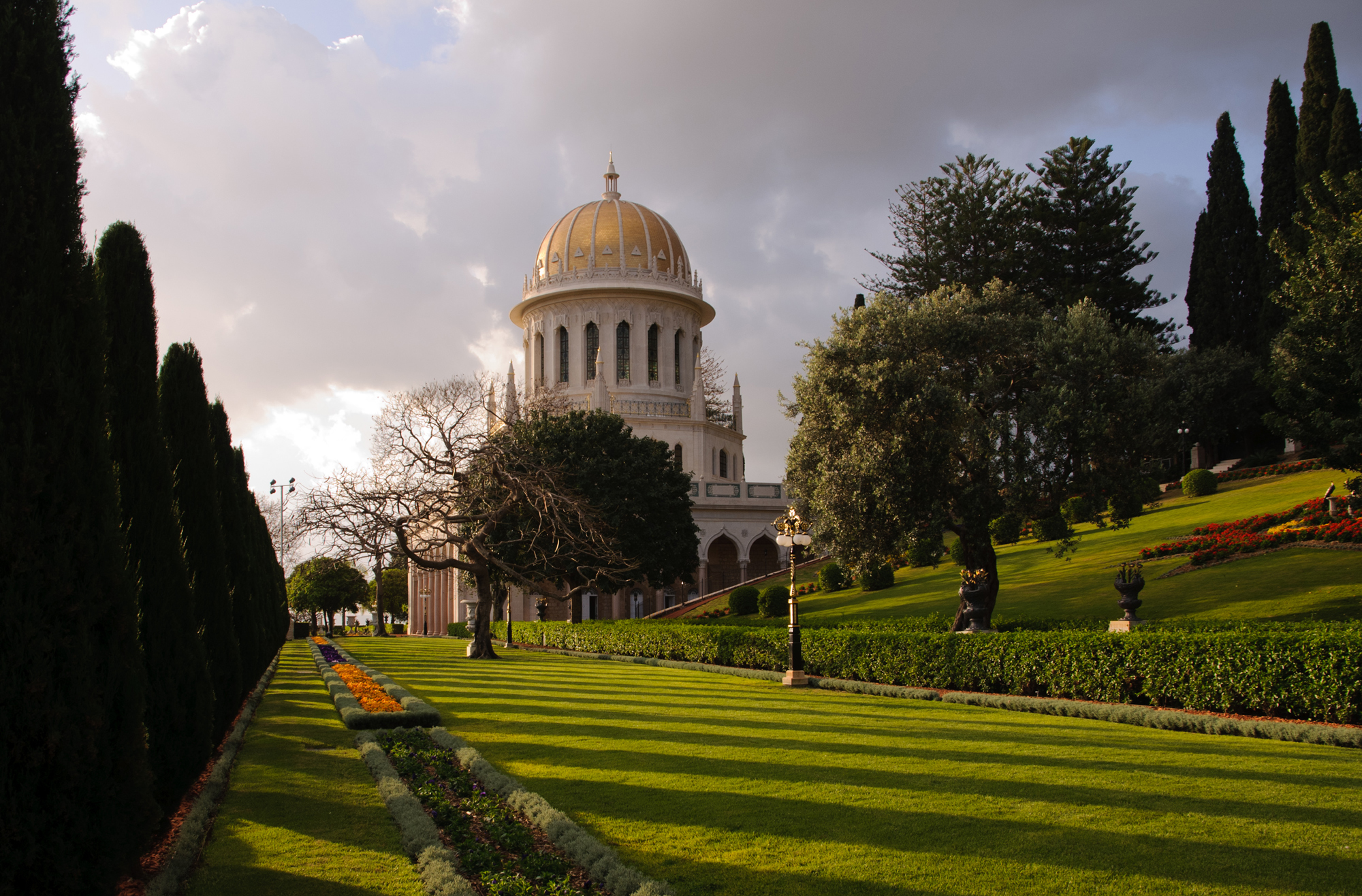 The Shrine of the Bab as seen from its western gardens, early in the morning of Tuesday 12 April 2011, shortly after its unveiling. The building's interior capacity has now almost doubled with the preparation of three new rooms to receive pilgrims and visitors for worship. Photo credit: Baha’i World Centre photo. All rights reserved.