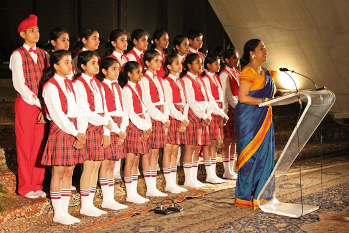 The children's choir of the Little Angels School of Gwalior sang prayers for dignitaries gathered at the Baha'i House of Worship in New Delhi, during a program marking the inauguration of its 25th anniversary year.