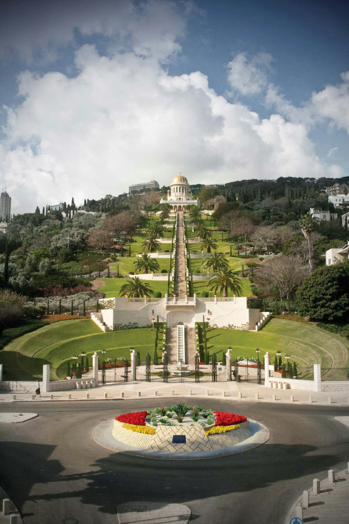 An artist's rendition of future plans for the UNESCO for Tolerance and Peace Square, in front of Haifa's Baha'i gardens. Proposals to enhance the site include upgraded stonework and decorative floral plantings in the centre of its traffic circle, establishing a symbolic bridge between the German Templer colony and the Baha'i gardens.