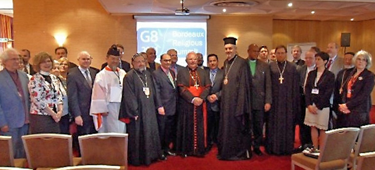 Representatives of the Baha'i, Christian, Jewish, Muslim, Shinto and Sikh faiths, with members of interfaith organisations, at the G8 Religious Summit in Bordeaux, 23-24 May 2011. Baha'i delegates were Susanne Tamas (far right) and Barney Leith (back row, third from right). Photo by Religions for Peace.
