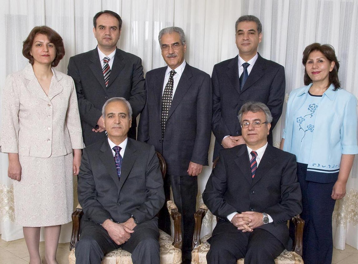 The seven Baha'i leaders, photographed several months before their arrest, are, in front, Behrouz Tavakkoli and Saeid Rezaie, and, standing, Fariba Kamalabadi, Vahid Tizfahm, Jamaloddin Khanjani, Afif Naeimi, and Mahvash Sabet.