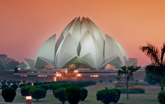 The Baha'i House of Worship in New Delhi, India. An estimated 70 million people have been welcomed through its doors since its opening 25 years ago, making it one of the world's most visited buildings. The temple is currently also highlighted in the "Incredible India" campaign, the Indian government's international strategy to showcase the cultural diversity and special achievements of the country.