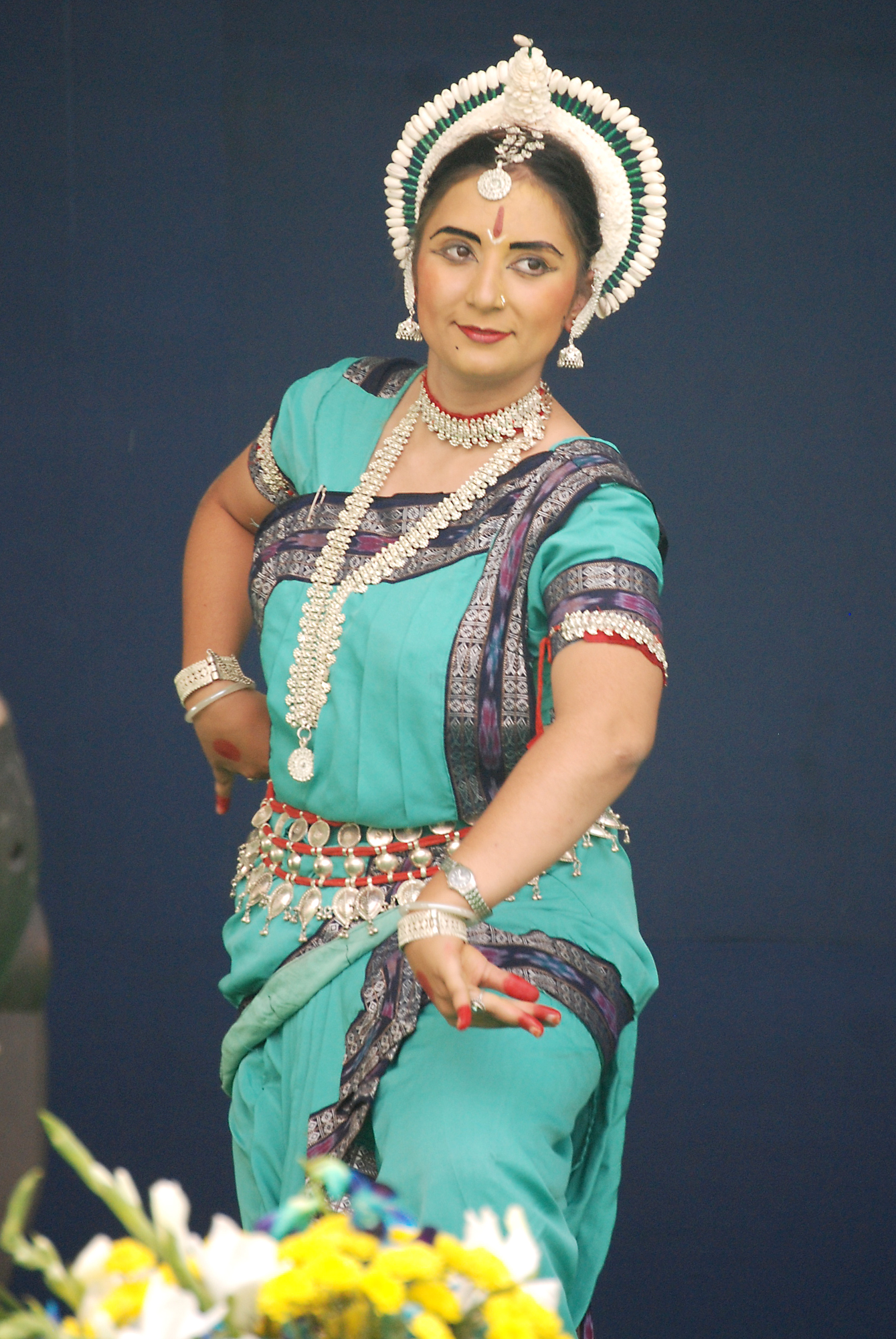 A traditional dancer from Odisha state, located on the east coast of India, performs at the 25th anniversary celebrations for the Baha'i House of Worship, New Delhi, 11-12 November, 2011.
