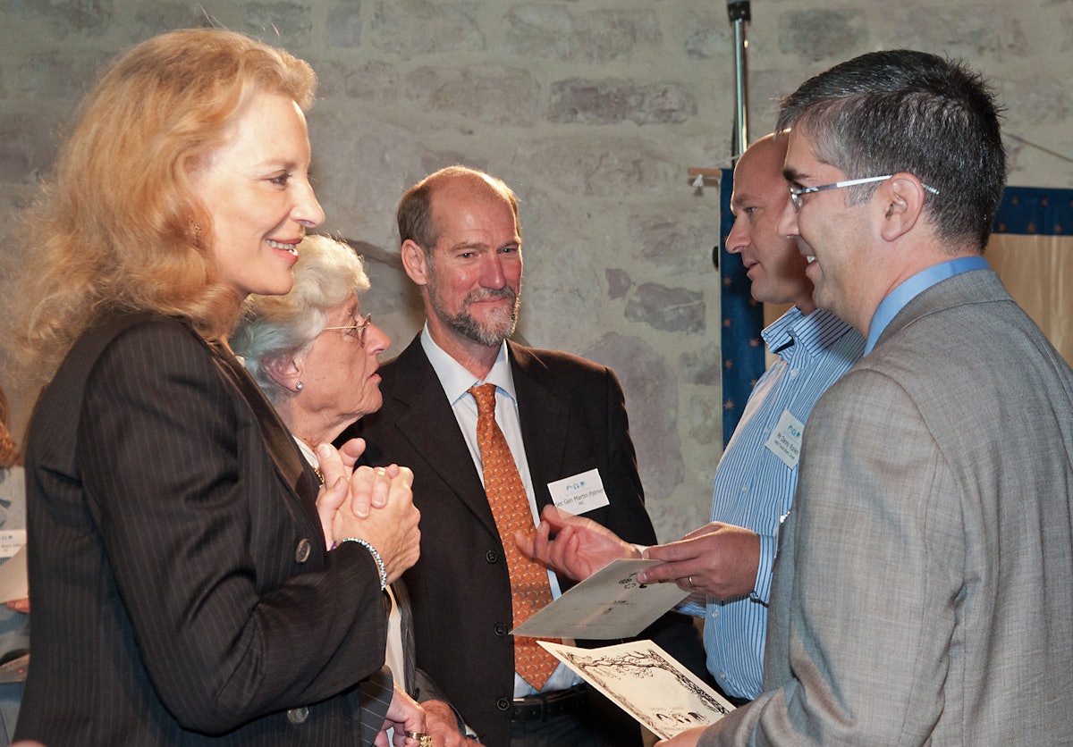 Jalal Hatami, Deputy Secretary-General of the Baha'i International Community – pictured right – speaks with Her Royal Highness Princess Michael of Kent at the launch of the Green Pilgrimage Network. Behind them, from left to right, are Sara Morrison, Vice President Emeritus of WWF International; Alliance of Religions and Conservation Secretary-General Martin Palmer; and Danny Ronen, general manager of Haifa Tourist Board. Photograph: ARC/Katia Marsh.
