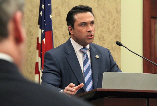 Representative Michael Grimm of New York speaking at a reception held on 15 February in the U.S. Capitol building to promote the passage of two Resolutions condemning Iran's human rights abuses. "We must let the Iranian government know that we are not going to tolerate the unjust persecution of the Baha'is or of any religion or of any Iranian citizen," said Representative Grimm.