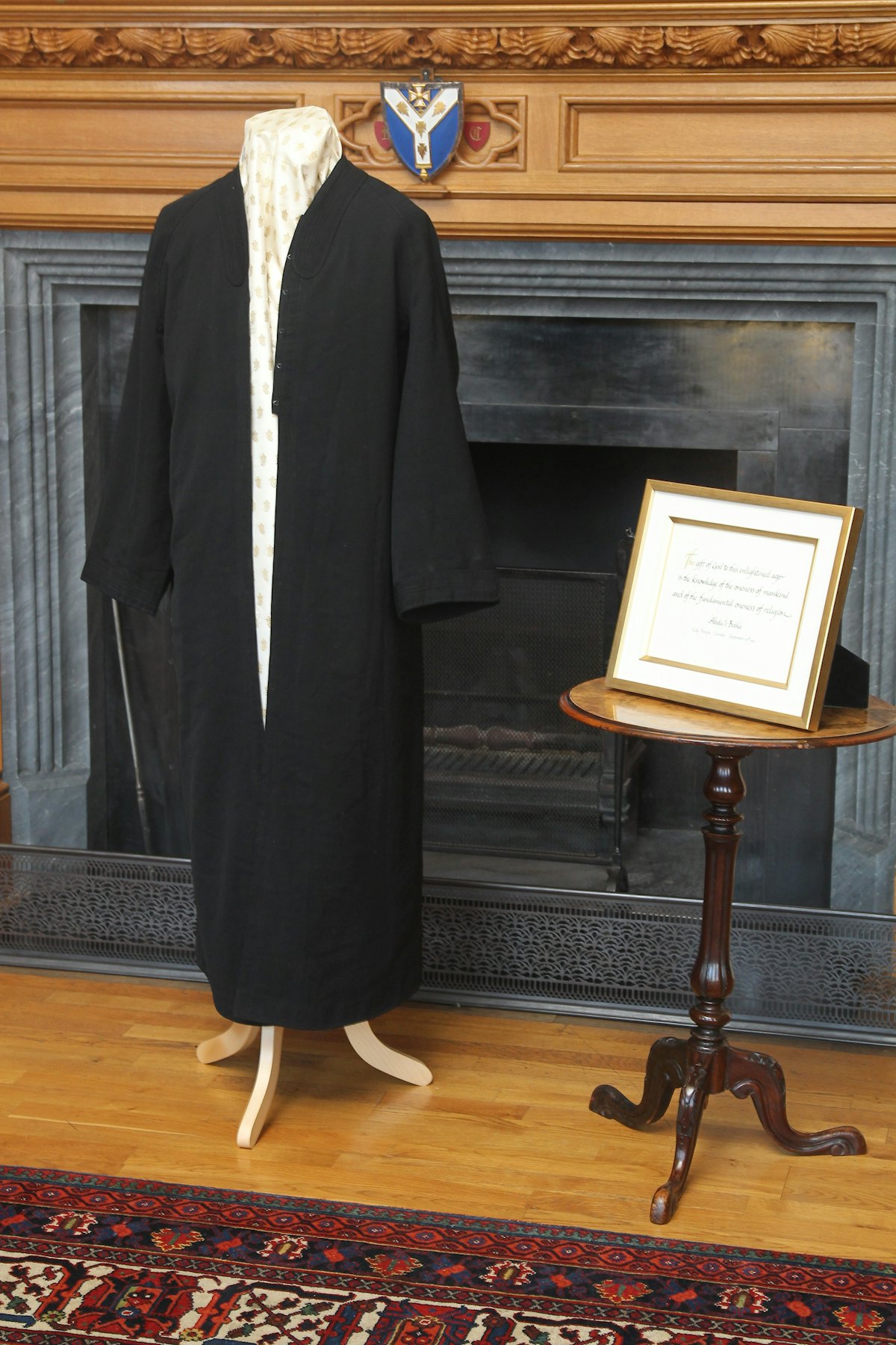 A robe worn by 'Abdu'l-Baha and a framed calligraphic rendering of words from His first ever public speech, delivered on 10 September 1911 at London's City Temple: "The gift of God to this enlightened age is the knowledge of the oneness of mankind and of the fundamental oneness of religion." The historic items were exhibited at a reception held at Lambeth Palace to mark the Diamond Jubilee of Her Majesty Queen Elizabeth II.