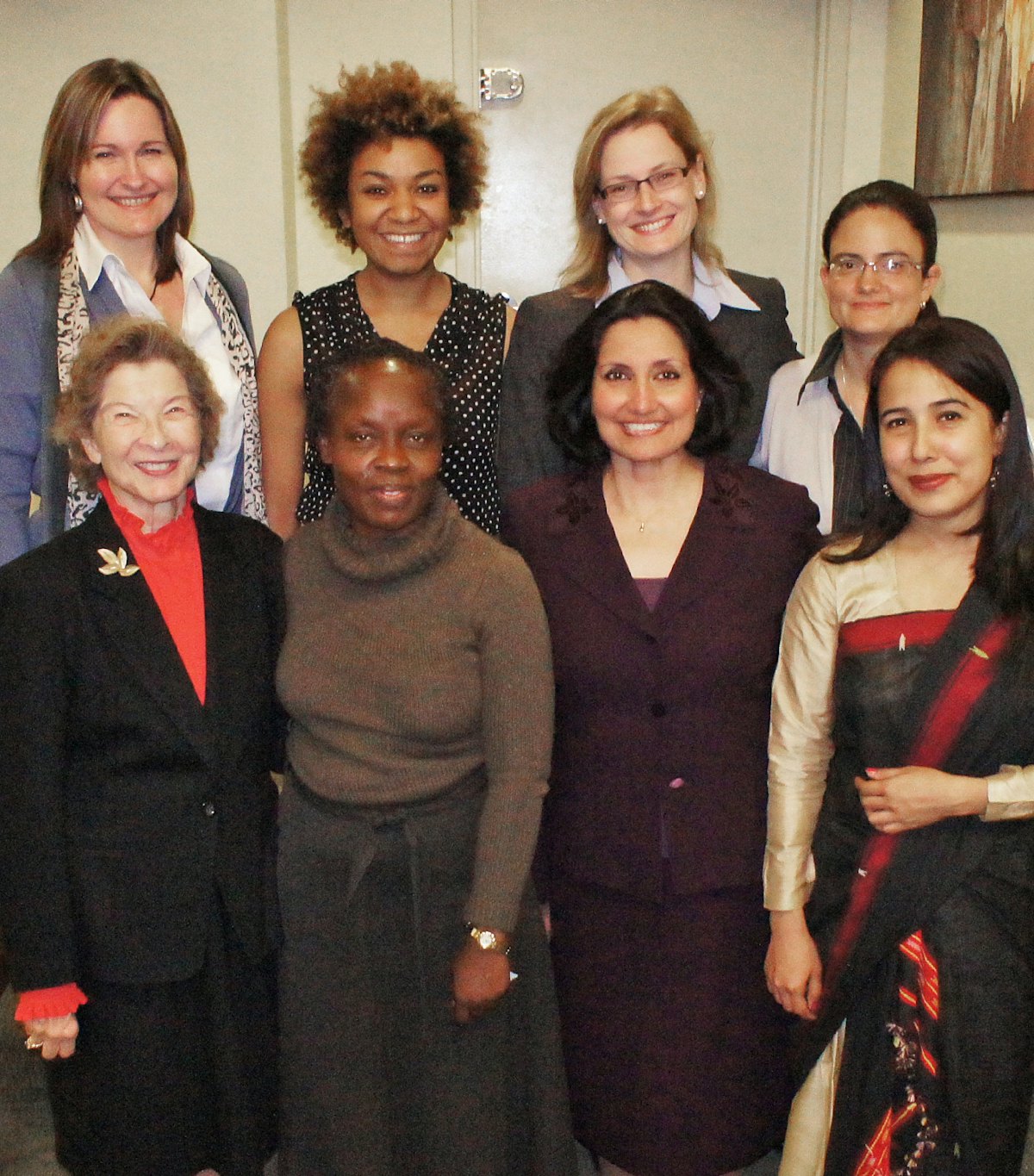 Among the Baha'i delegates to the 56th Commission on the Status of Women, held in New York from 27 February-9 March 2012, were: back row, from left, Lori Noguchi (Macau), May Akale (BIC), Julia Berger (BIC), Leslie Stewart (Colombia); Front row: Florence Kelley (Hawaii), Elizabeth Kharono (Uganda), Bani Dugal (BIC), and Nilakshi Rijkhowa (India).