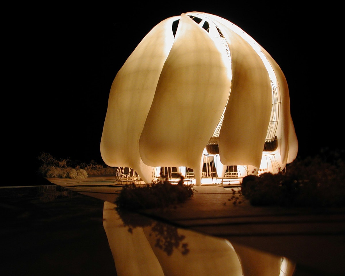An early model of the Baha'i House of Worship for the South American continent, now under construction in Santiago, Chile, simulating how it will appear at night. "The Architectural Review" wrote that it "should become a gentle and welcoming beacon to the whole of South America."
