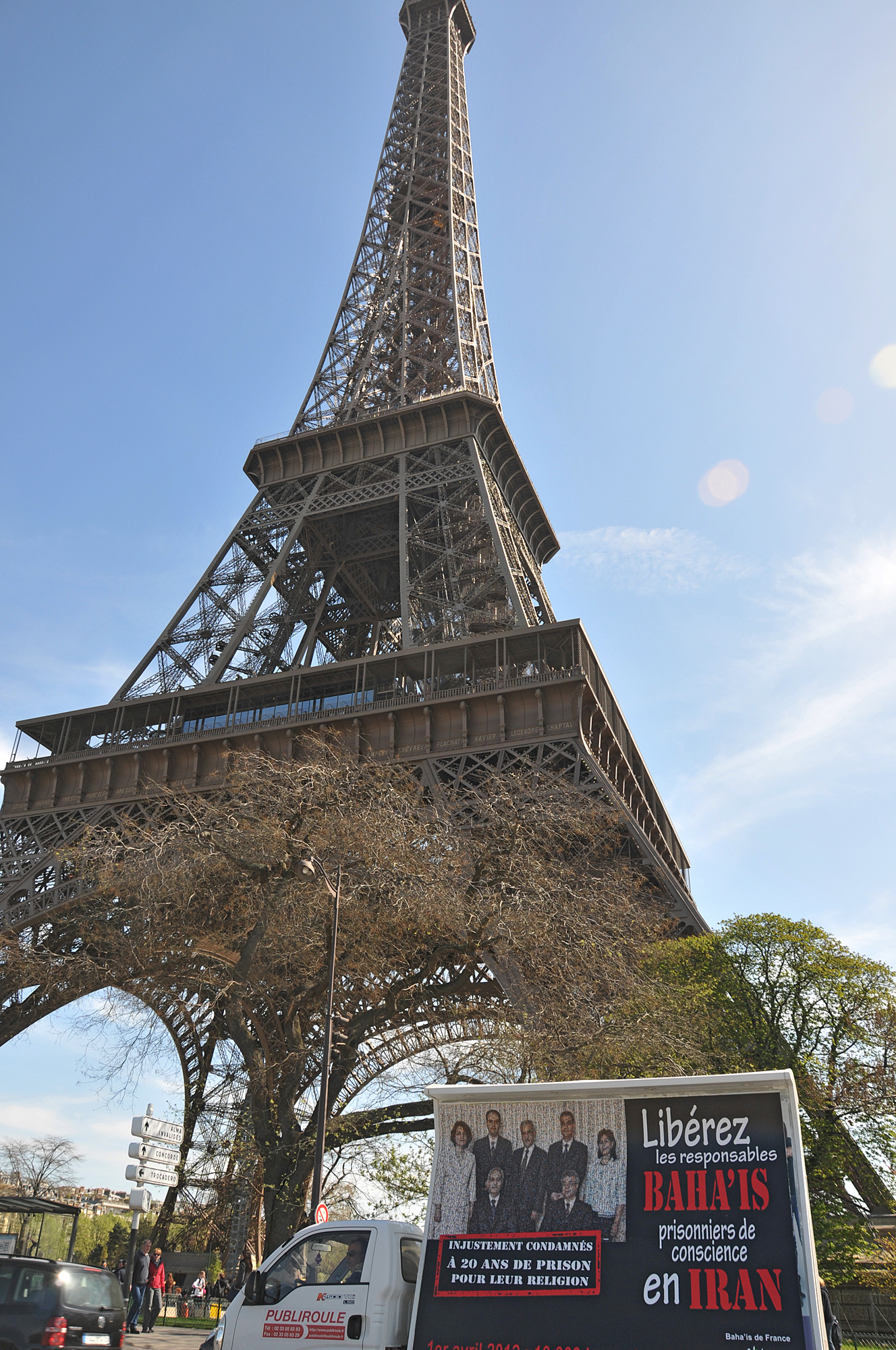 In Paris, France, a mobile billboard depicting Iran's seven imprisoned Baha'i leaders travels past the famous Eiffel Tower, on Sunday 1 April.