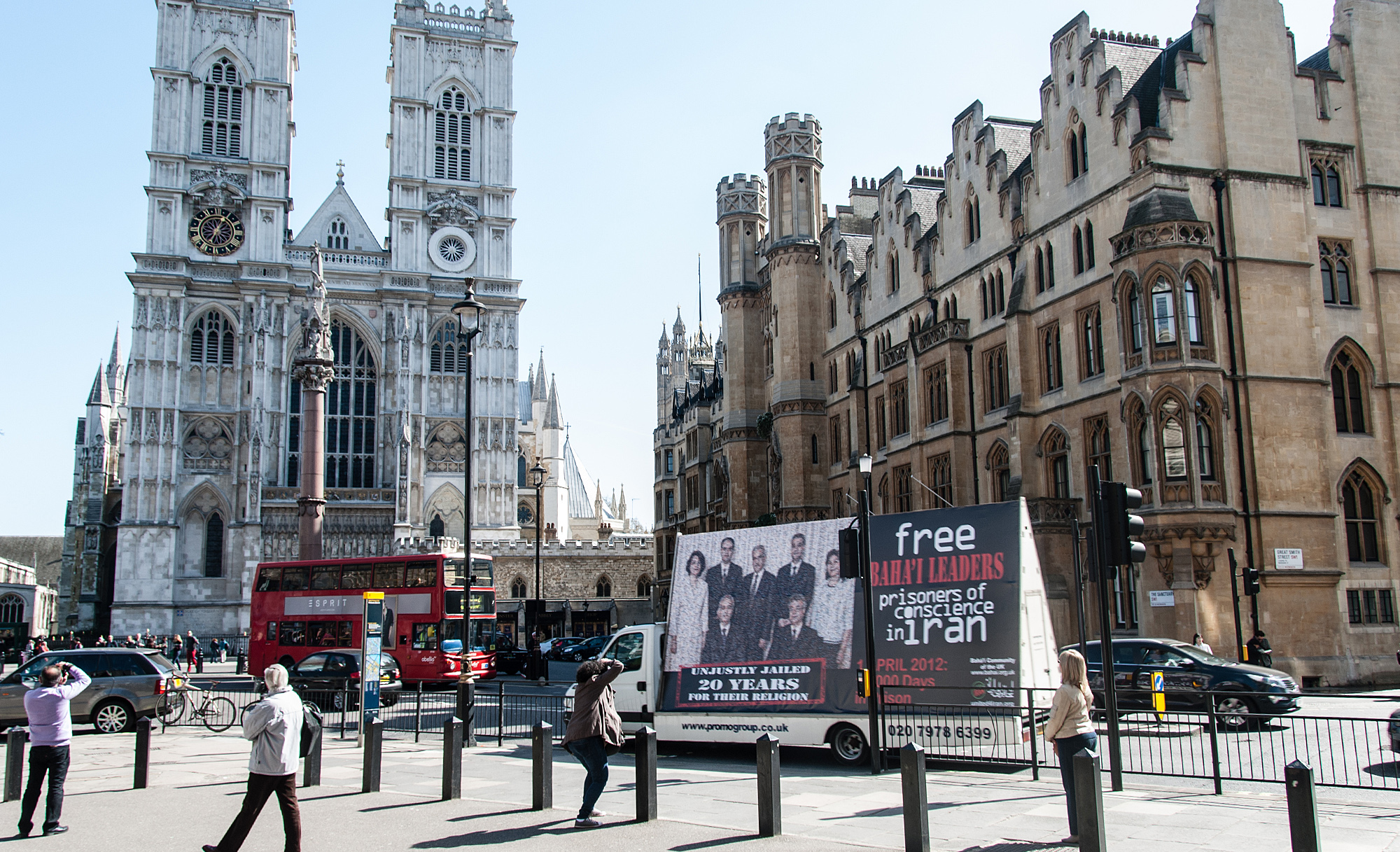 In central London, a mobile billboard calling for freedom for Iran's seven Baha'i leaders approaches the historic Westminster Abbey.