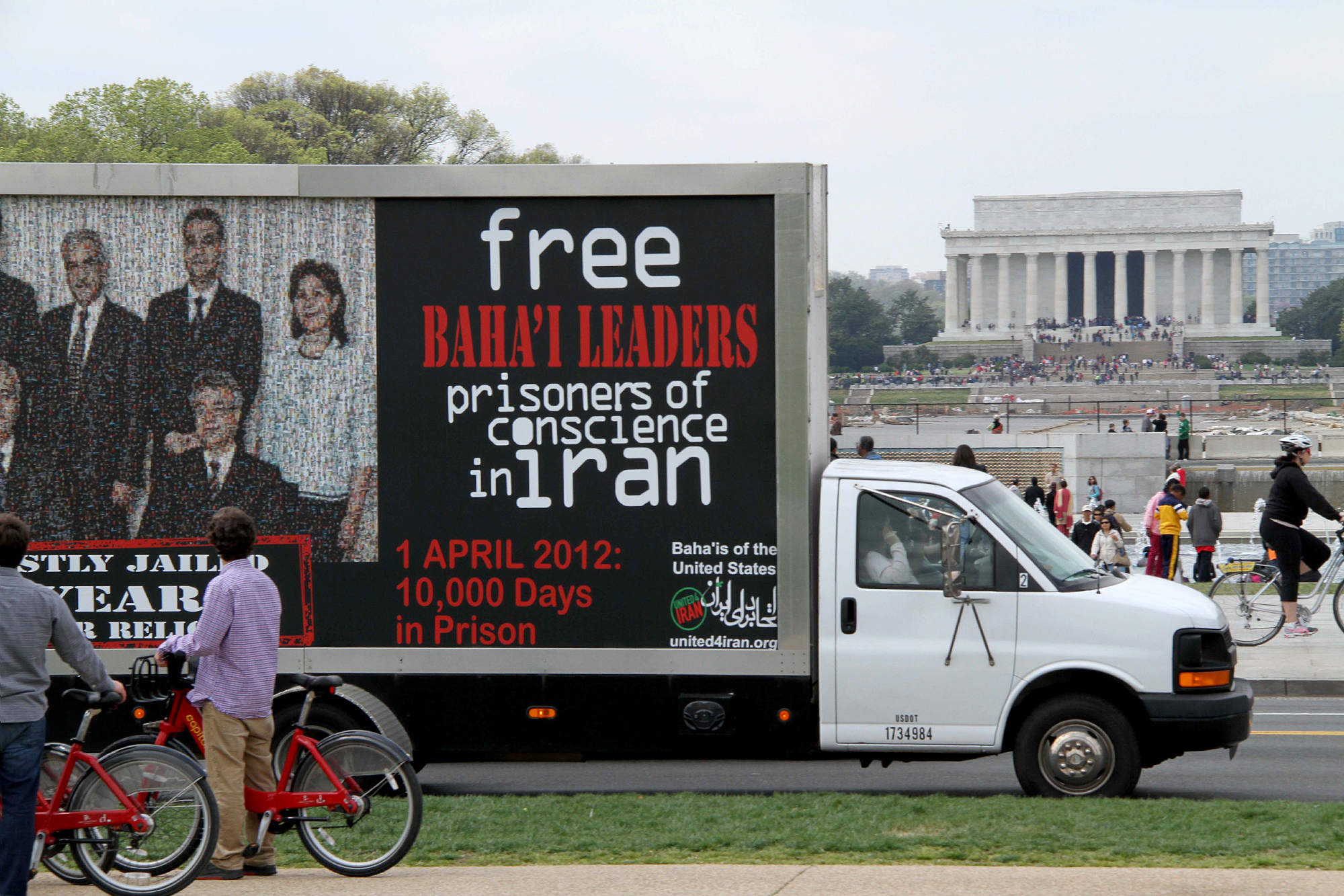 In Washington D.C, a mobile billboard calling for the release of Iran's seven Baha'i leaders attracts interest in front of the city's Lincoln Memorial, on Sunday 1 April.