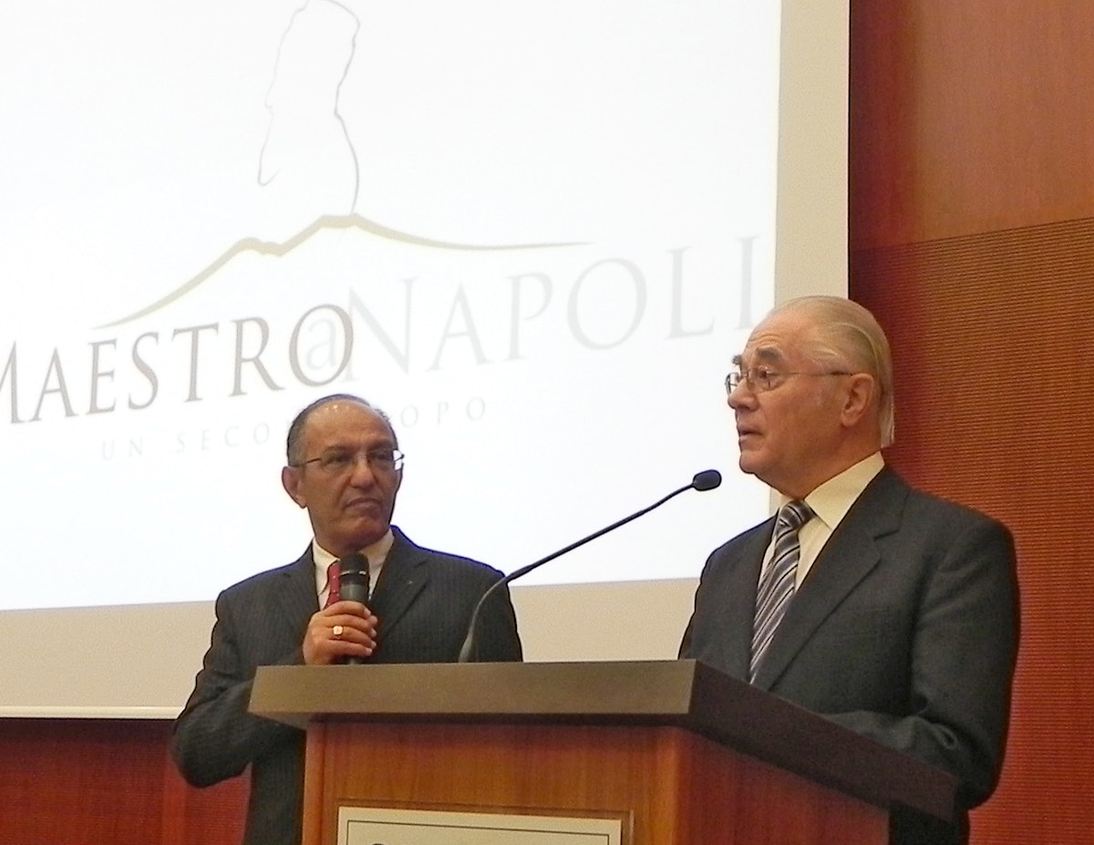 Hartmut Grossmann – pictured right – a former member of the Universal House of Justice, addresses the gathering marking the centenary of 'Abdu'l-Baha's visit to Naples, 31 March to 1 April 2012. Pictured left is Mr. Grossmann's translator, Fatollah Sabet.