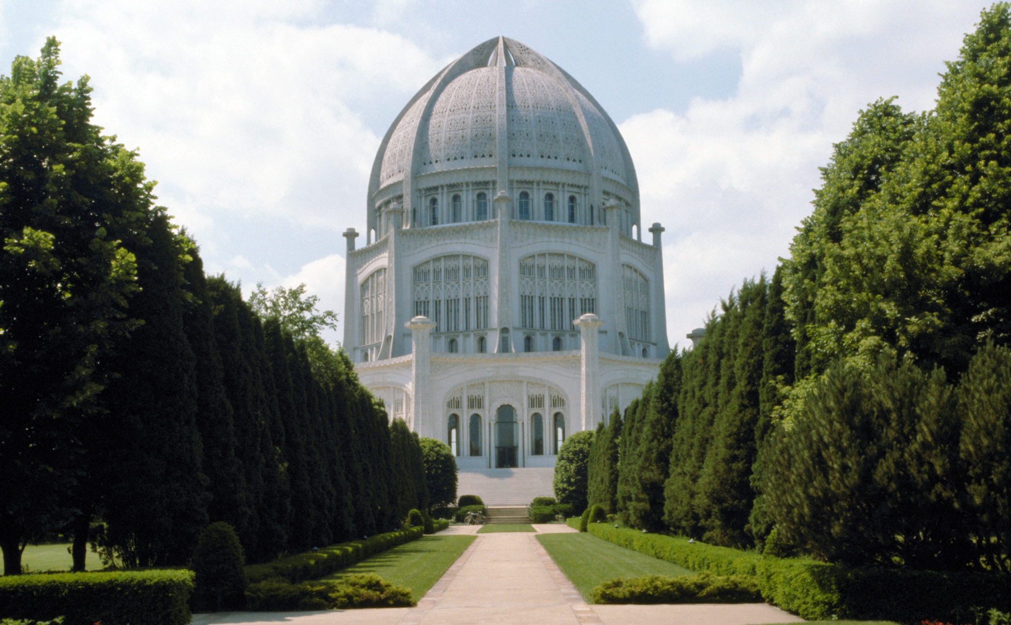 The oldest surviving Baha'i House of Worship stands on the shores of Lake Michigan at Wilmette, Illinois, U.S.A. The cornerstone of the temple was laid by 'Abdu'l-Baha 100 years ago on 1 May 1912. Construction work began in 1921, and it was finally completed in 1953.
