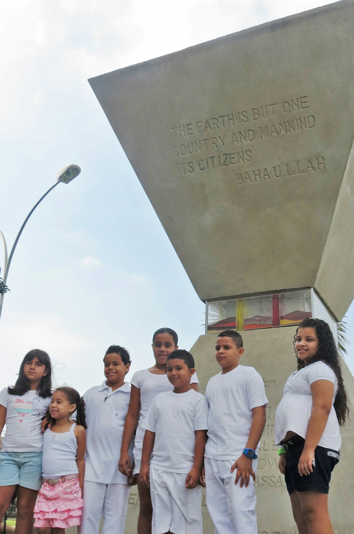 An hourglass-shaped 'Peace Monument" in Rio bearing the words of Baha'u'llah was re-dedicated on 17 June 2012. The monument was an initiative of the Baha'i International Community and the Baha'i community of Brazil for the 1992 Earth Summit. More than 100 people attended the ceremony including the UN Secretary-General for Rio+20 Sha Zukang, the monument's designer Siron Franco, and Eduardo Paes - mayor of Rio.