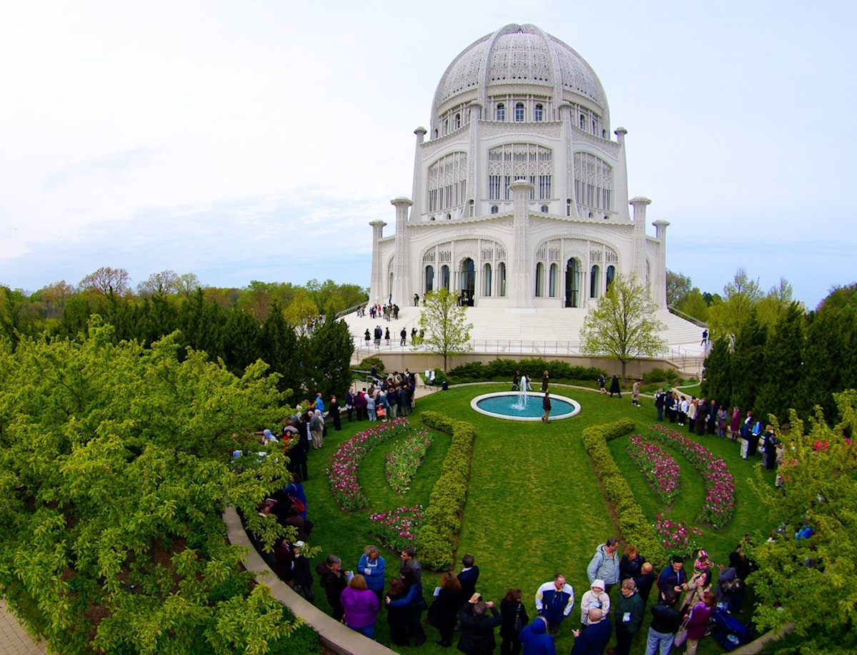 Visitors gather at the Baha'i House of Worship in Wilmette, Illinois, for a special commemorative program held on 29 April 2012, marking the centenary of 'Abdu'l Baha's laying of the building's cornerstone. Three services included prayers read by children in several languages, selections of sacred writings sung by the Temple's choir, and the rare opportunity for visitors to hear a recording of 'Abdu'l-Baha's own voice.