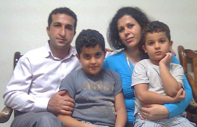 Pastor Youcef Nadarkhani, left, pictured with his wife, Fatemah, and their two young sons. Photo credit: Christian Solidarity Worldwide.