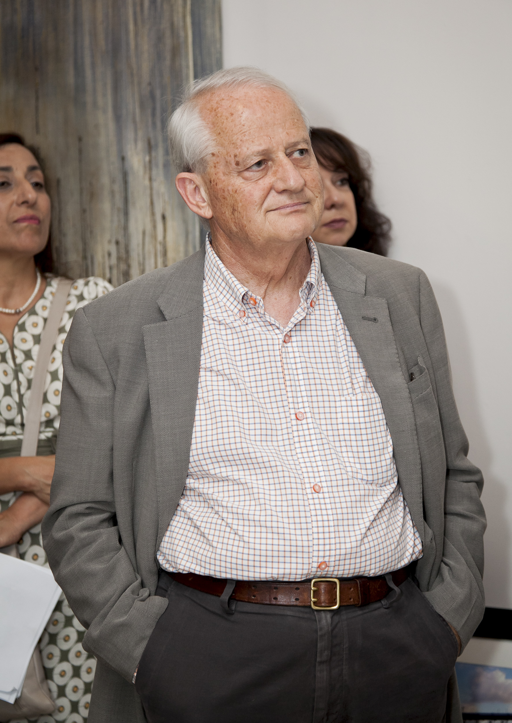 Philip Ruddock MP, a member of Australia's House of Representatives and former Attorney General, attending the 15 December opening of an art exhibition staged in Newtown, Sydney, which includes works by artists who have family or friends who have faced persecution and imprisonment by the Iranian regime.