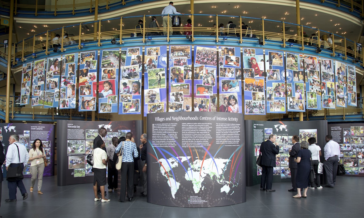 In the foyer of the Convention Centre in Haifa, visitors viewed an exhibition highlighting activities of Baha'i communities in diverse parts of the world.