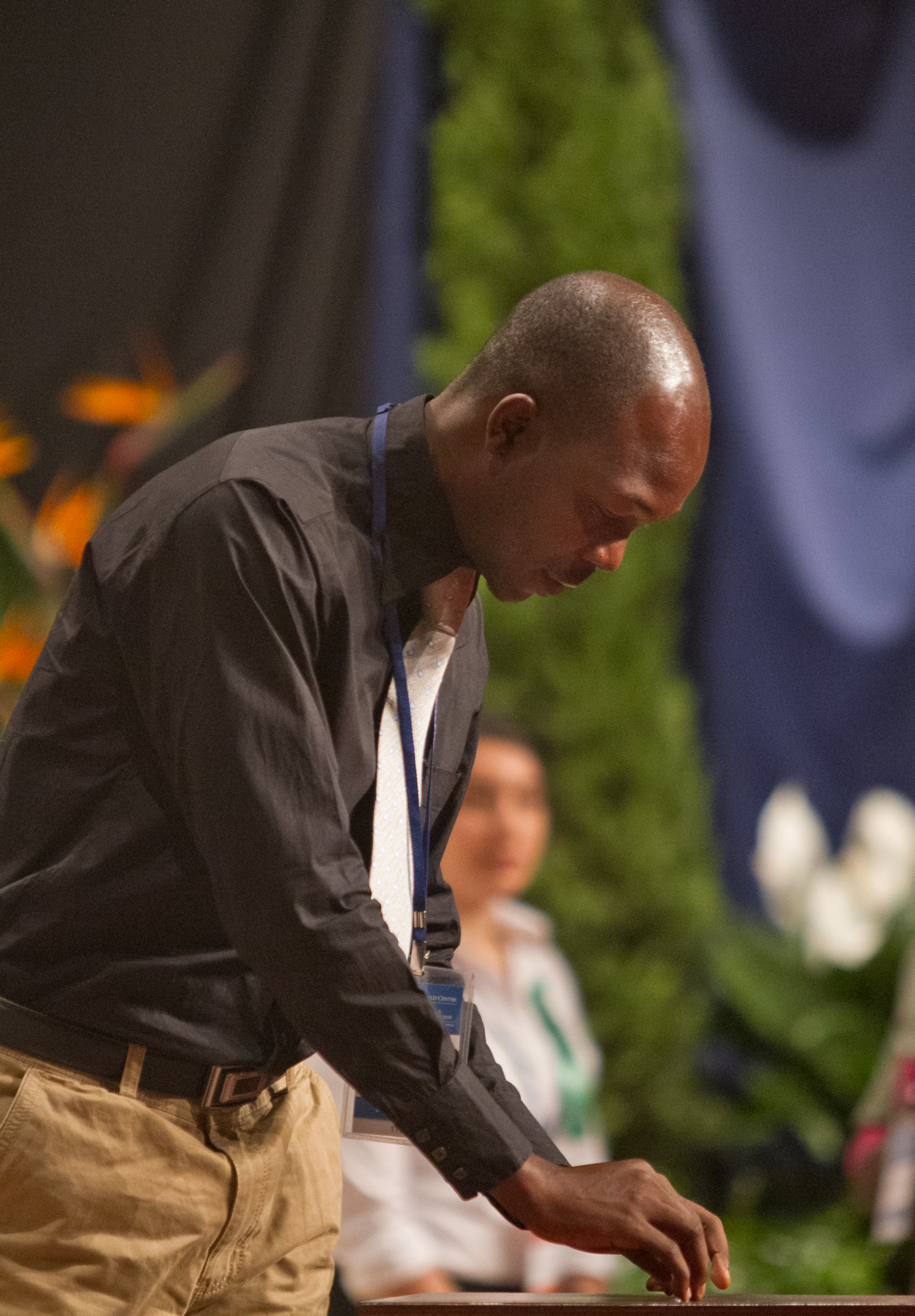 A delegate casts his vote in the election of the Universal House of Justice.